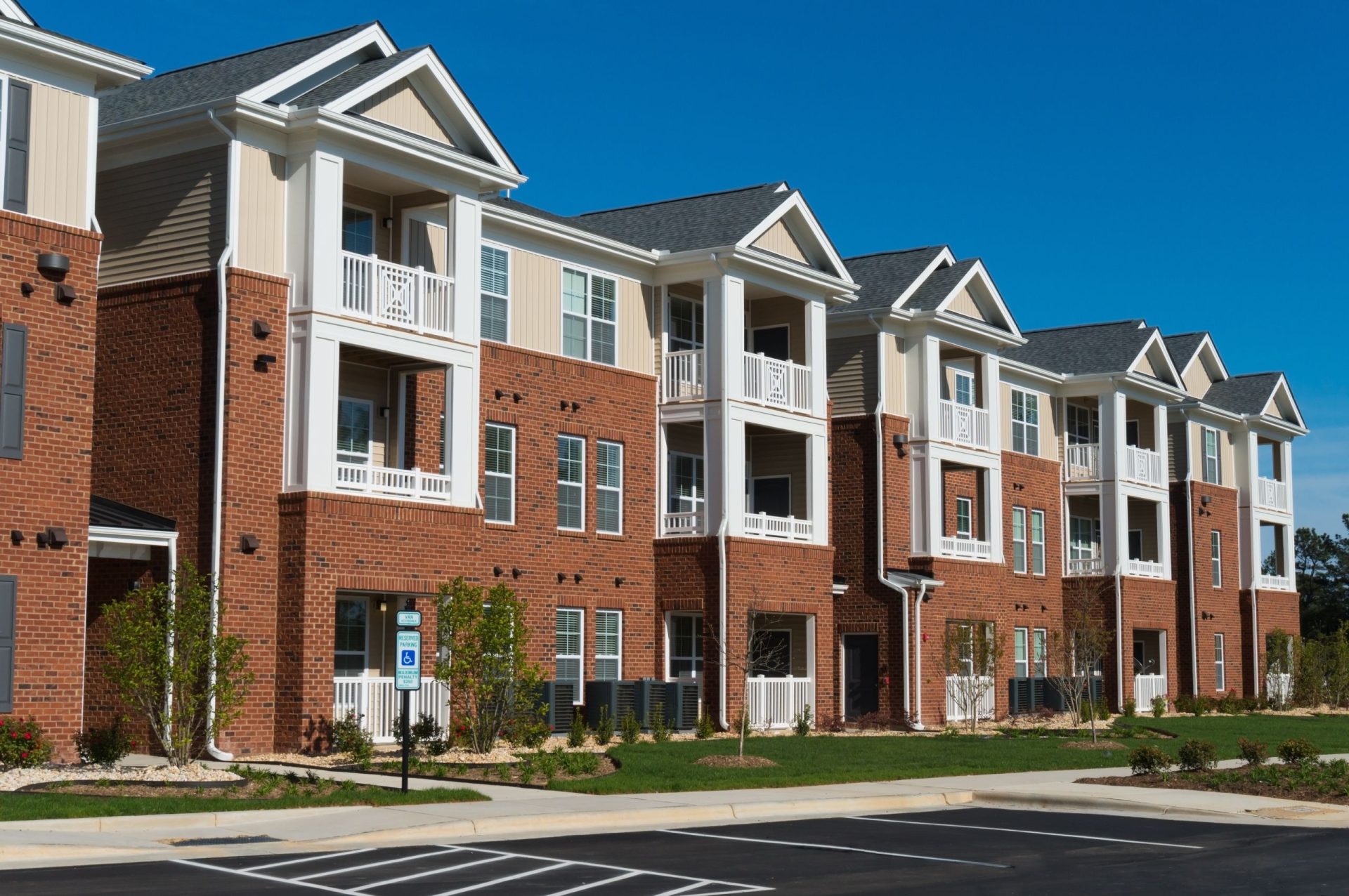 Multi family building with asphalt shingle roof